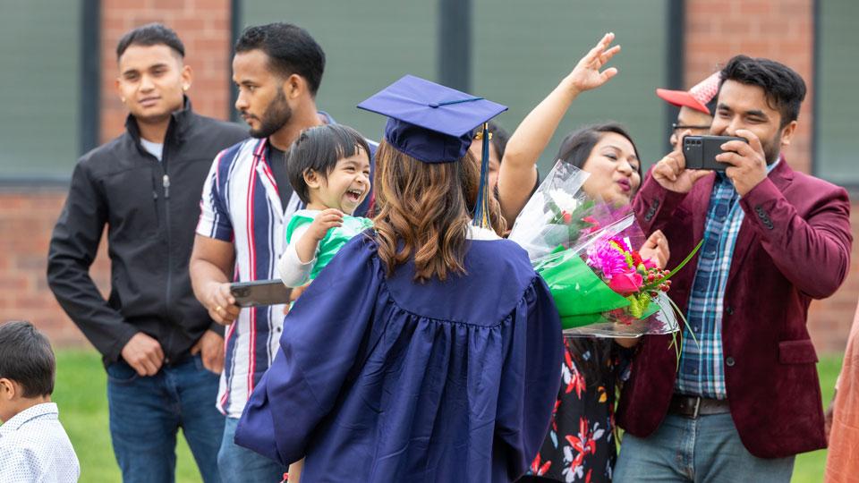 Family of international student celebrating graduation